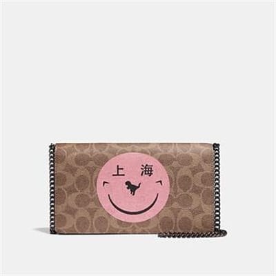 Fashion 4 - CALLIE FOLDOVER CHAIN CLUTCH IN SIGNATURE CANVAS WITH REXY BY YETI OUT