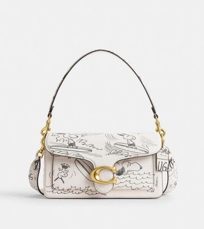 Fashion 4 - Coach X Peanuts Tabby Shoulder Bag 26 With Newspaper Print