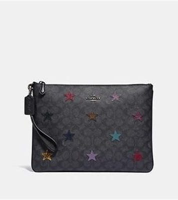 Fashion 4 - LARGE WRISTLET 30 IN SIGNATURE CANVAS WITH STAR APPLIQUE AND SNAKESKIN