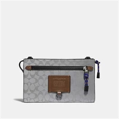 Fashion 4 - RIVINGTON CONVERTIBLE POUCH IN REFLECTIVE SIGNATURE CANVAS
